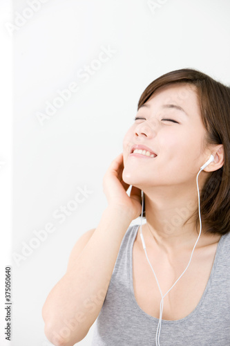 young woman listening to music