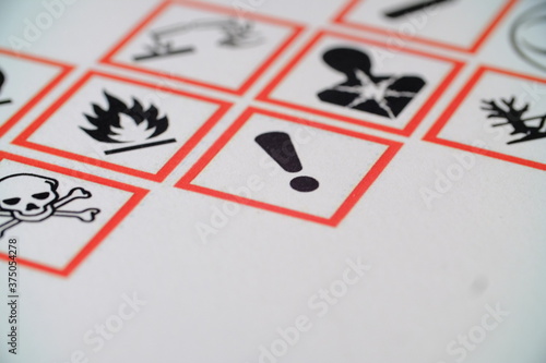 WHMIS 2015 SYMBOLS WORKPLACE HAZARDOUS MATERIAL INFORMATION SYSTEM. SKULL AND CROSSBONE MAIN FOCUS. FLAME, SYMBOLS ON PAPER. POISONOUS SYMBOL FOR INDICATORS AND FOR EMPLOYEE AND EMPLOYER