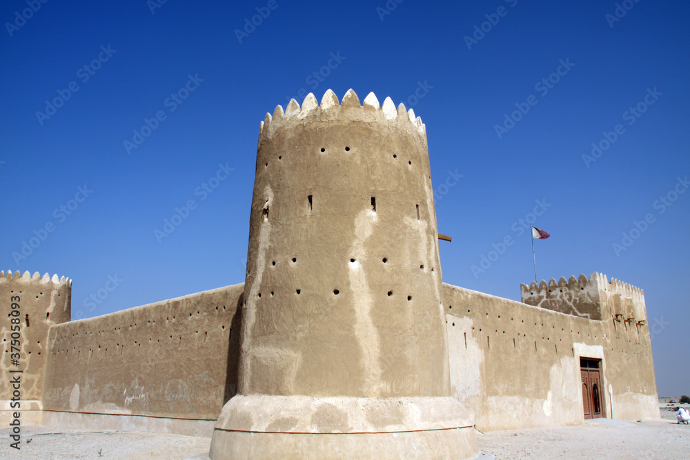  Old fortress with high walls, north west of Qatar desert 