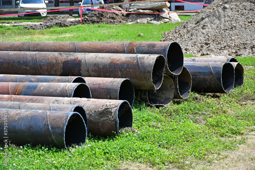 Large metal pipes at the construction site Large metal pipes at the construction site
