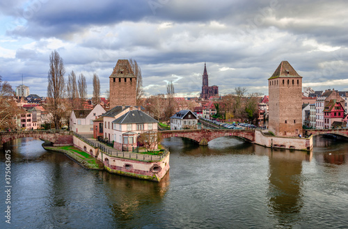 The Ponts Couverts  a set of 3 bridges and 4 towers that make up a defensive work erected in the 13th century on the River Ill in Strasbourg  France. Petite France is in the background.