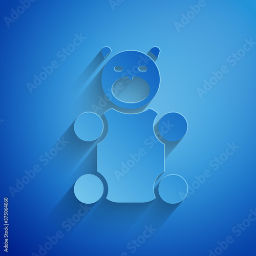 Paper cut Jelly bear candy icon isolated on blue background. Paper art style. Vector.