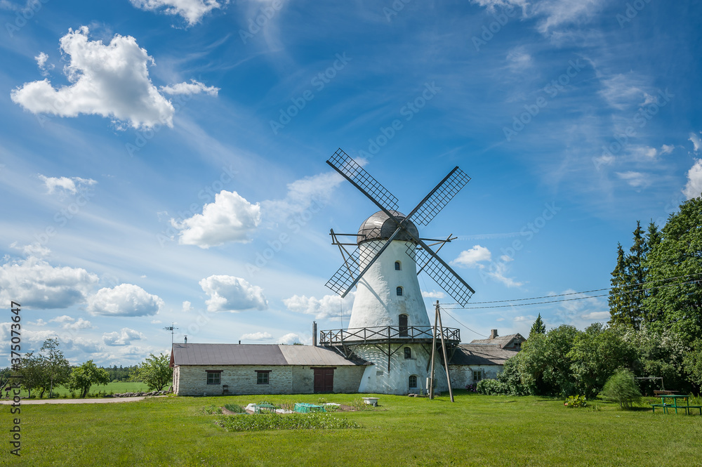 Landscape with an old windmill. Amazing summer view of Puraviku windmill, Estonia.
