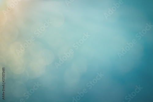 Surface of blue swimming pool background of water in swimming pool. Simulate natural wave ocean water texture summer or abstract blue sea water with white foam blank for copy space, Nature concept. © Phokin