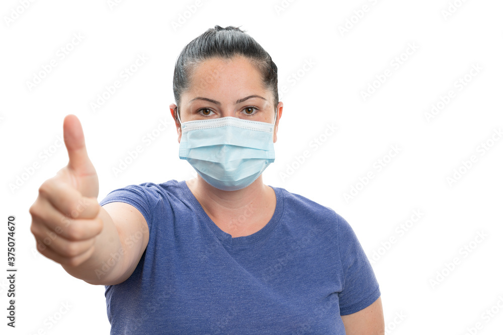 Female model making like gesture wearing surgical or medical mask Female model making like gesture wearing surgical or medical mask