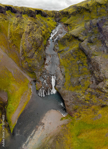 Vertical aerial view of Stjornarfoss Waterfalls in Iceland, summer season