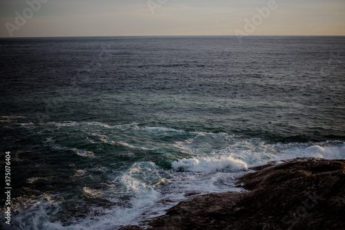 waves at sunset