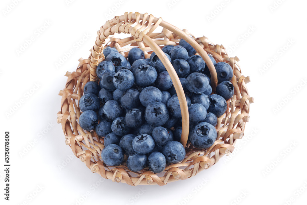 Freshly picked blueberries in basket Freshly picked blueberries in basket