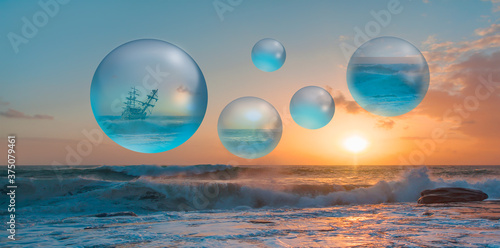 Old Sailing-ship in storm sea, dramatic sunset in the background with many air soap bubble