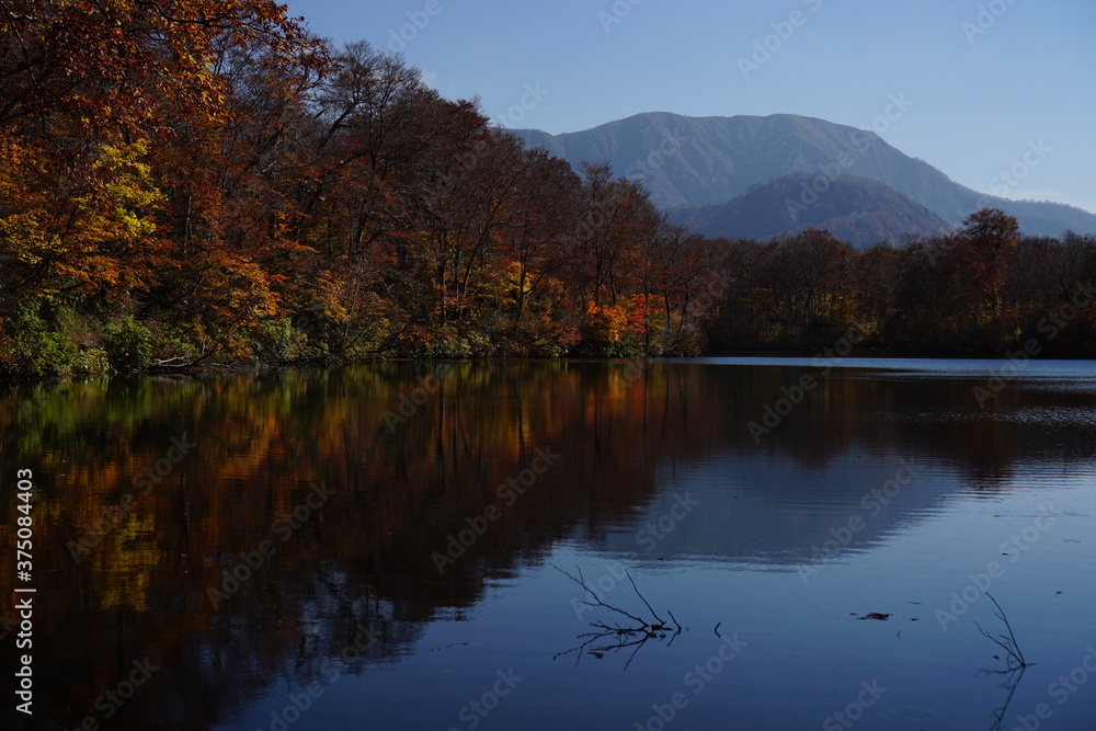 Beautiful lake reflection in autumn landscape at Northern Alps of Japan, Otari, Nagano