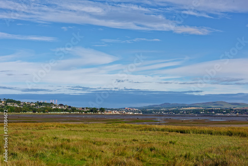 Looking back over the beginning of Tay Heath towards the small town of Tayport and Brought Ferry across the Tay Estuary at Low Tide.