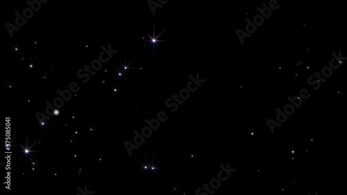 Twinkling stars background. Stars shimmering in air. Dust particles fly in slow motion in the air. Loop animation