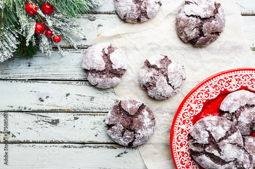 Bilde på lerret Chocolate crinkle cookies with powdered sugar icing, top view