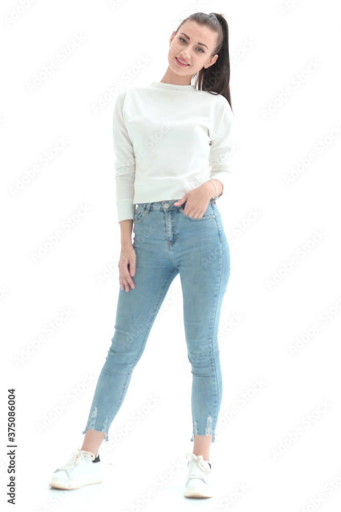 in full growth.a pretty young woman in casual clothes in full growth.a pretty young woman in casual clothes