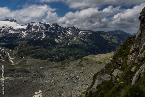 Great views to the peaks and glaciers of the Austrian Alps, Hohe Tauern park. Picturesque and beautiful scene, full of dark clouds, snow and peace in soul. Near city Enzingerboden, Austria, Europe.