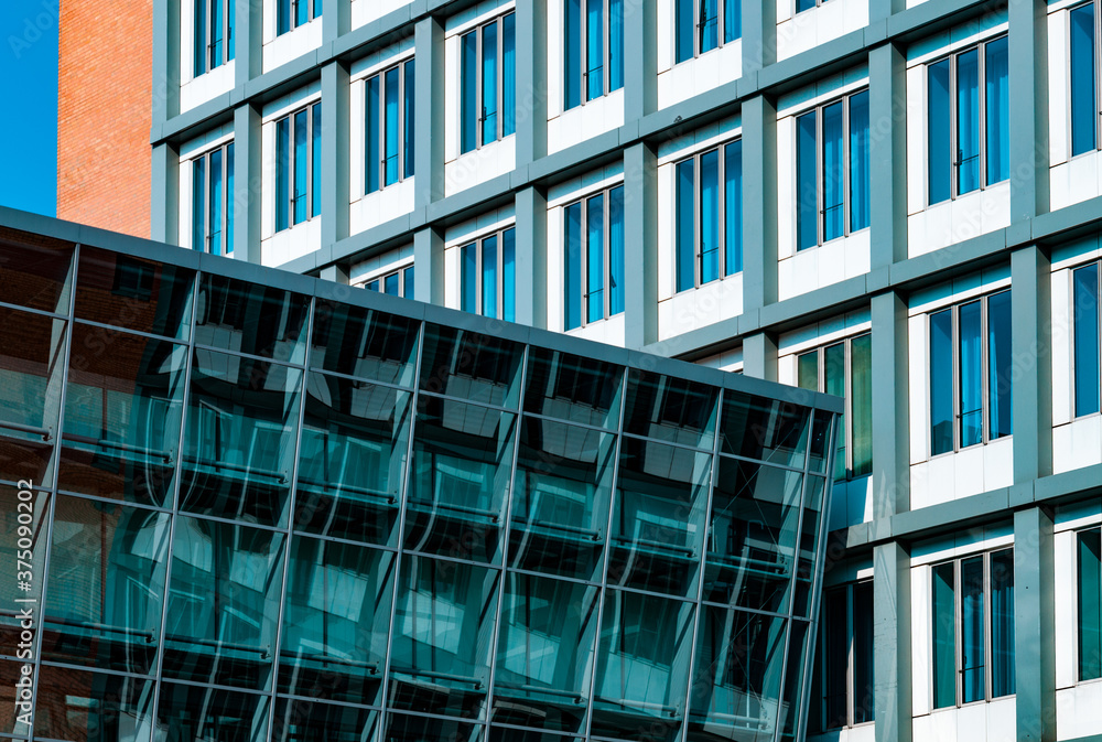 Modern office building. Framed windows wall of skyscraper in Hamburg Germany