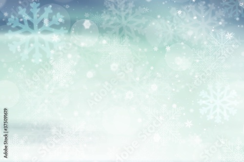 Blue green abstract christmas background with snowflakes white bokeh stars blurred beautiful shiny light  use for card new year wallpaper backdrop