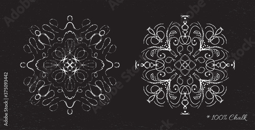 Set snowflakes drawn in chalk on a black background vector