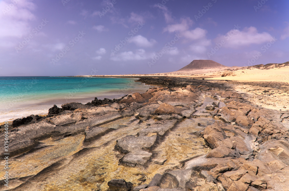 Shallow lagoon Bahia del Salado on La Graciosa, Canary Islands, textures and surfaces