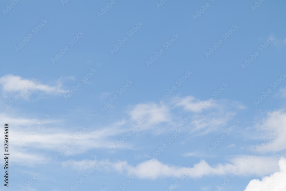White clouds on a background of blue sky, sky background. White clouds on a background of blue sky, sky background.