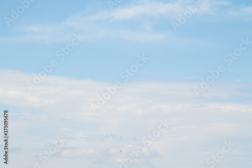 Blue sky with white clouds, sky background. © Prikhodko