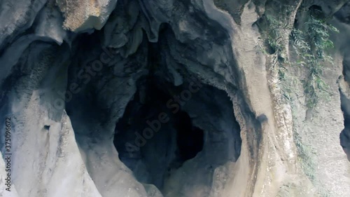 Entrance to the erotic cave. The entrance resembles an open vulva, and the arch and walls of the vagina. Cave of Venus. Laos
 photo