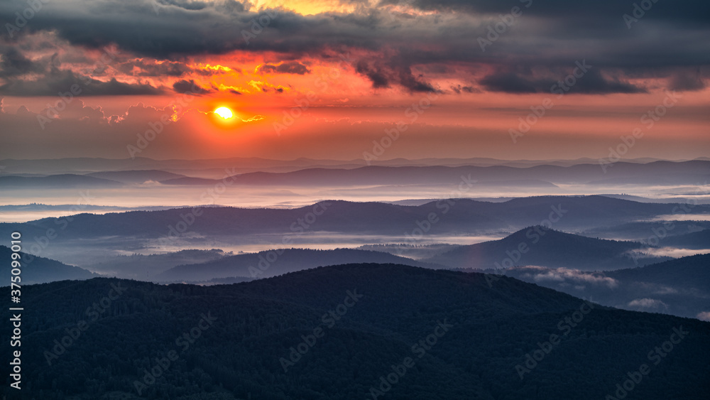 Superb mountain vista. Summer sunrise in the Carpathian Mountains. Bieszczady National Park. Poland.
