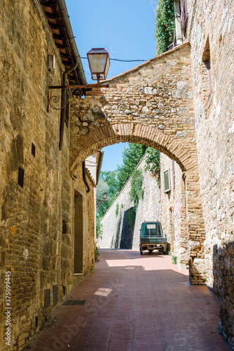 Old alley of San Gimignano  Italy. San Gimignano is a typical Tuscan medieval town.