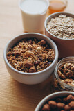 a delicious and crunchy oatmeal granola with honey, nuts, dried fruits and grains. Dynamic healthy food photography