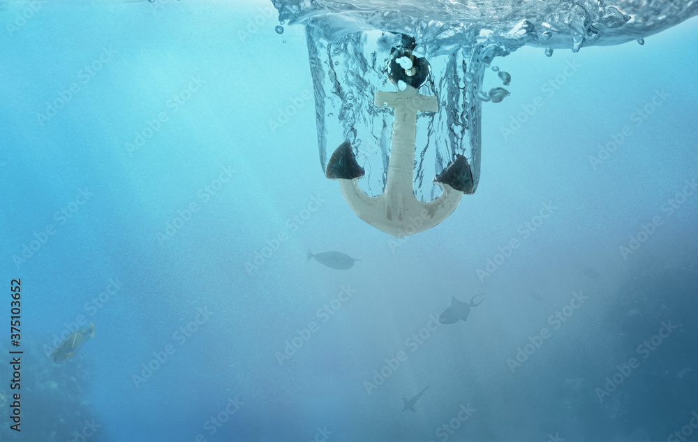 Obraz premium Anchor sinks under water