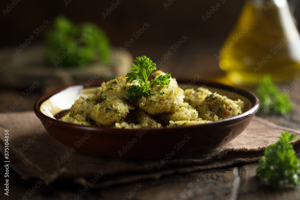 Homemade potato gnocchi with parsley pesto and bread crumbs