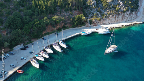 Aerial drone photo of picturesque small fishing village of Frikes a safe anchorage for sail boats and yachts in island of Ithaki or Ithaca, Ionian, Greece