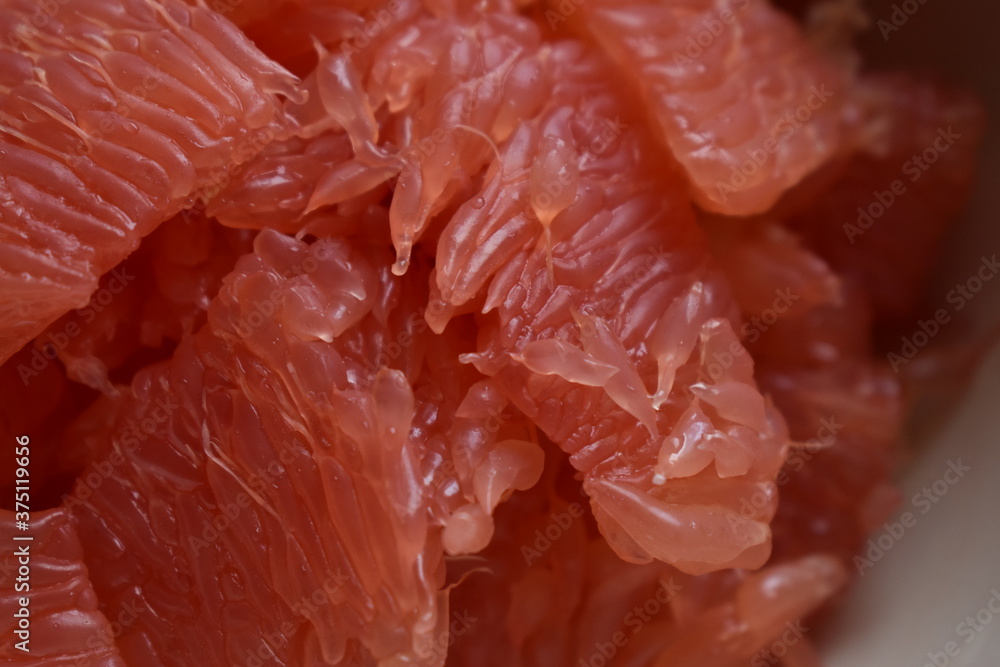 Fresh pink grapefruit, pomelo fruit detail close up