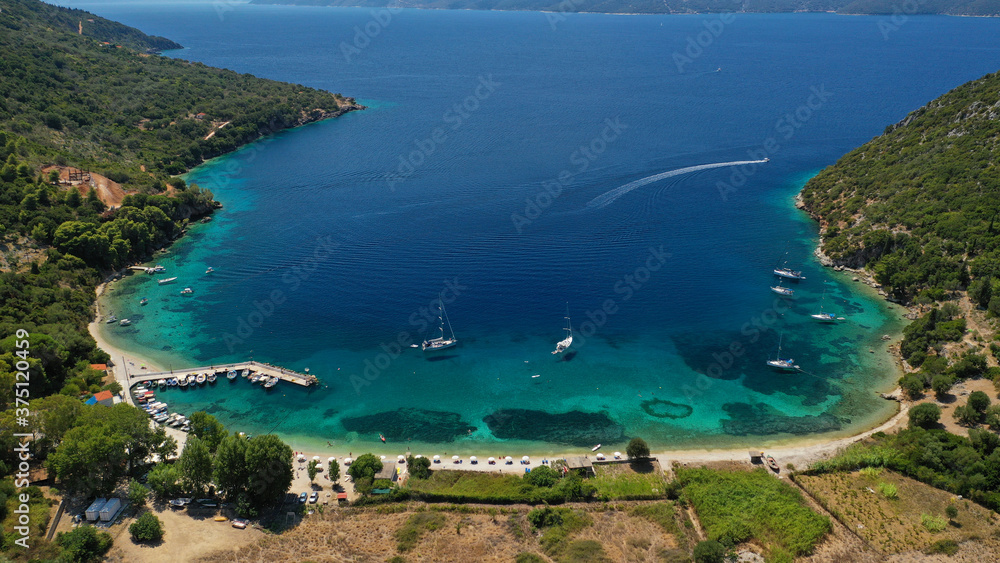 Naklejka premium Aerial drone photo of bay and beach of Polis in Northern part of Ithaki or Ithaca island a safe sail boat anchorage, Ionian, Greece