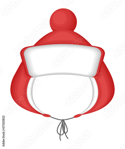 Funny childs red hat with earflaps with a pompom. Isolated icon on a white background. Vector illustration.