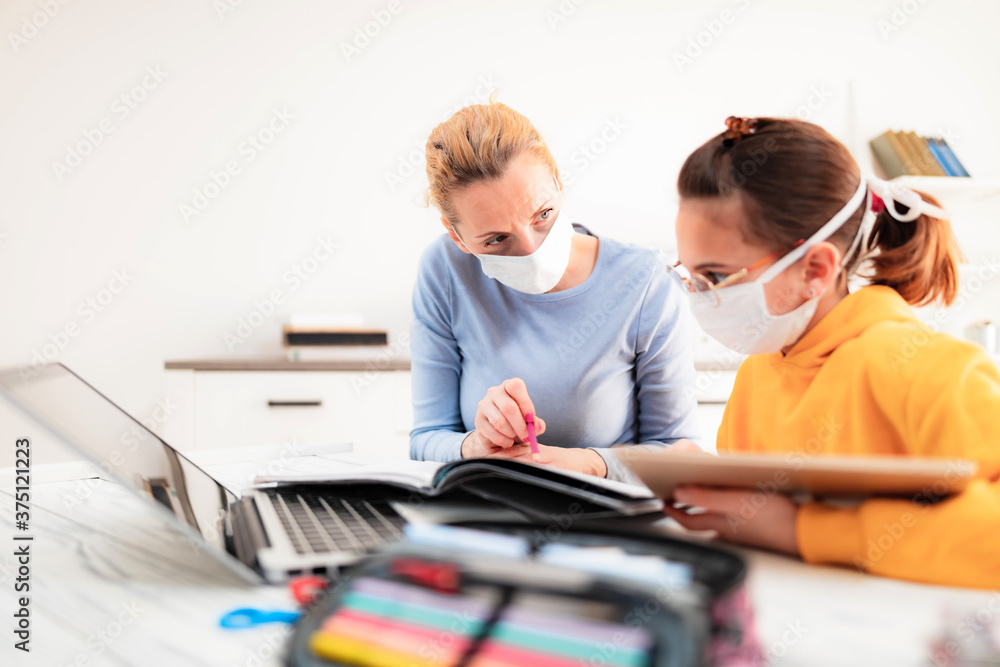 Child home studying education, homeschooling, with private tutor / mother with protective mask in the time of viruses, flu and seasonal pandemic, healthy approach in social contact. Child home studying education, homeschooling, with private tutor / mother with protective mask in the time of viruses, flu and seasonal pandemic, healthy approach in social contact.