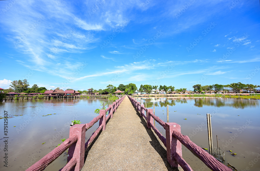 Naklejka premium bridge on the lake at wetlands Thale Noi Phatthalung, THAILAND.