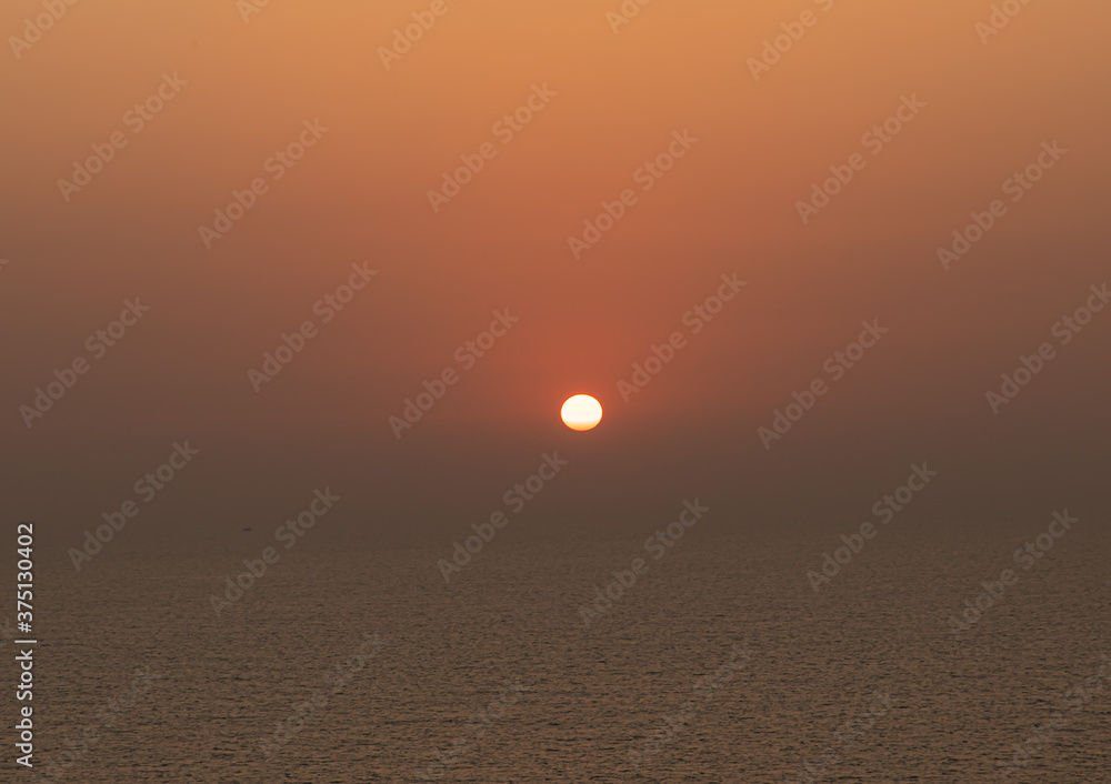 sunset at beach of  goa,india