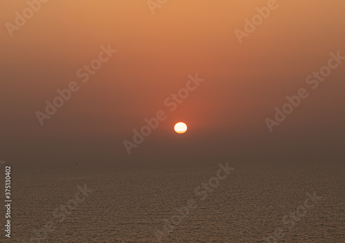 sunset at beach of  goa india