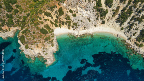 Aerial drone photo of turquoise paradise sandy beach and bay of Filatro a safe sail boat anchorage in Ithaki or Ithaca island, Ionian, Greece © aerial-drone