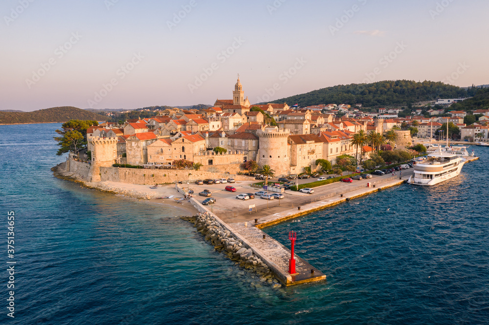 Sunset over the Korucla medieval old town by the Adriatic sea in Croatia