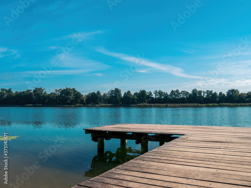 Wooden pier on a lake in Poland in Masuria