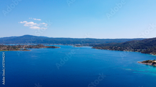 Aerial view of group of islands in blue sea 