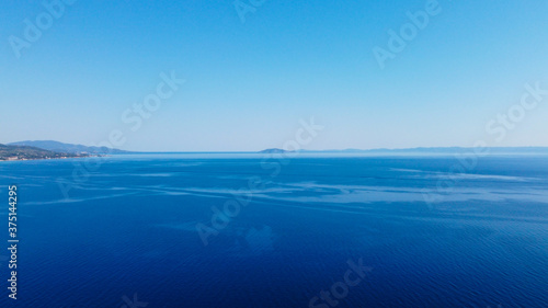Open blue sea under blue sky.Aerial view 