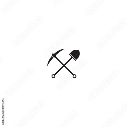 Принти на полотні Pickaxe and shovel vector icon illustration