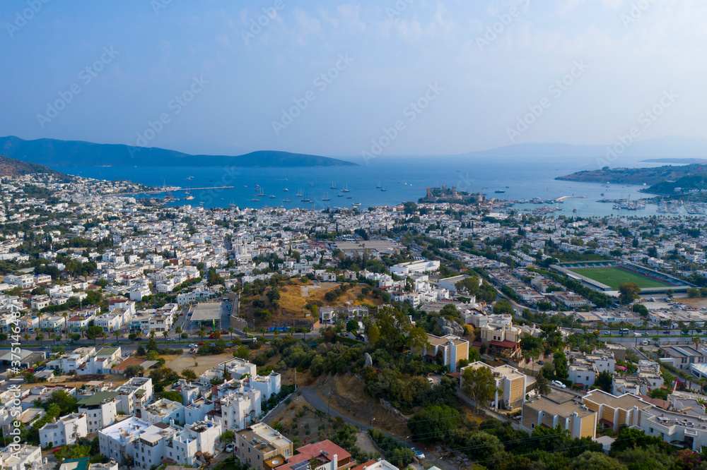 Bodrum is a city on the Bodrum Peninsula, stretching from Turkey's southwest coast into the Aegean Sea. The city features twin bays with views of Bodrum Castle. 