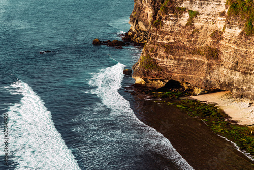 Islands of Indonesia. Summer landscape with sea and mountain range. Mountain view on the horizon in the sea. Beautiful mountains and blue sea. Landscapes Of Indonesia. Nusa Penida. Copy space