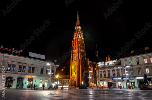 Vászonkép Main town square and famous cathedral by night in Osijek, Croatia