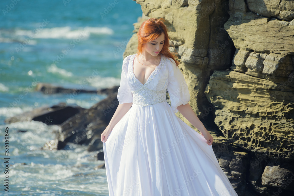 Young woman over blue sea background. Young woman over blue sea background.