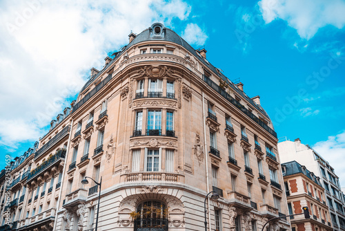 Antique building view in Paris city, France.